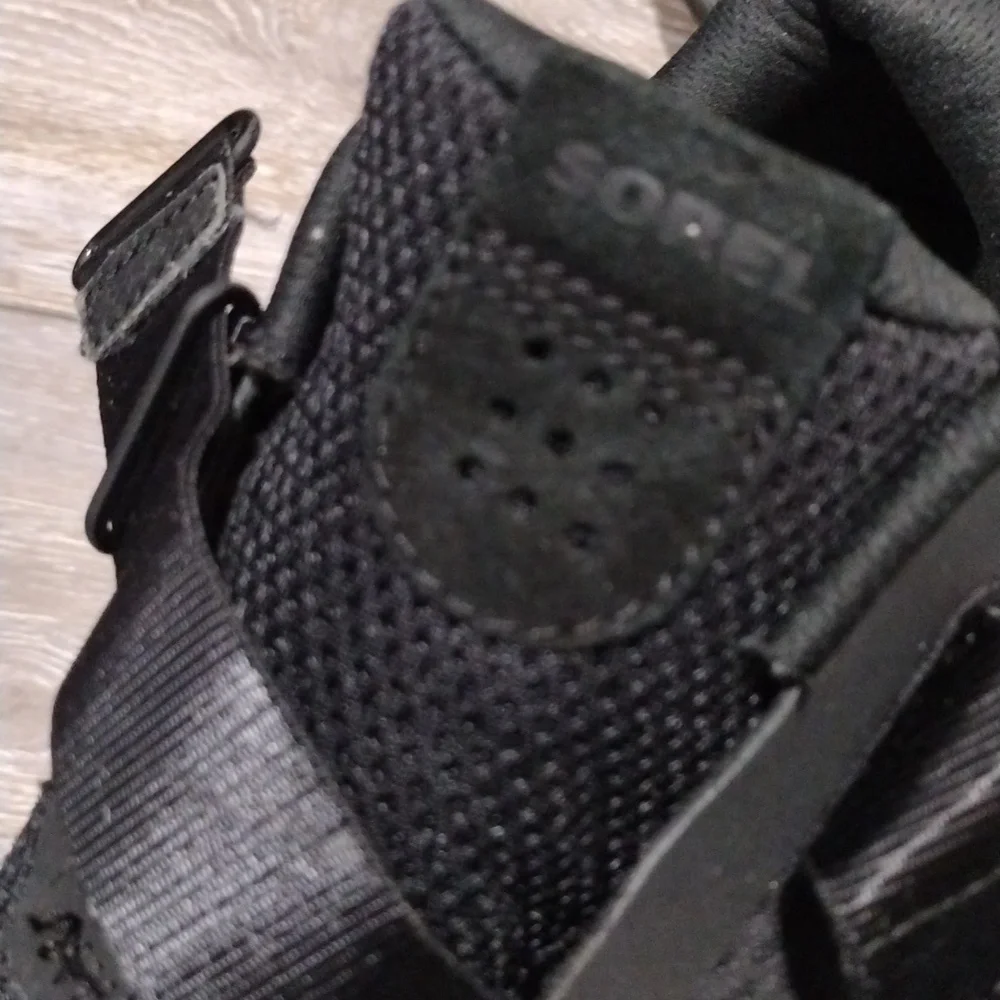 Sorel womens black leather and black mesh sneakers. Mint condition. Size 9